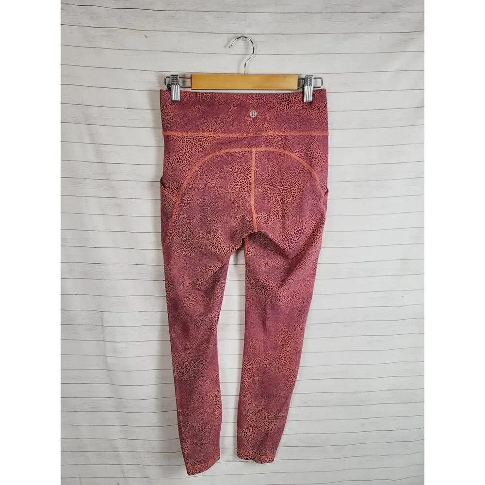 Lululemon Invigorate High-Rise Tight 25” in Crackle Orange, sz 6